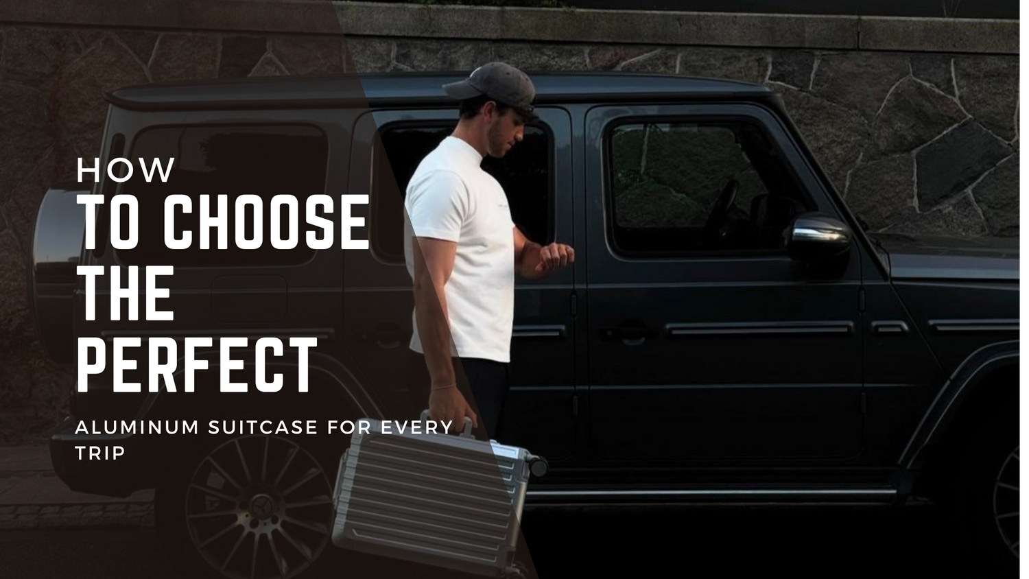 "Traveler rolling an Armus aluminum suitcase with smooth 360-degree spinner wheels."