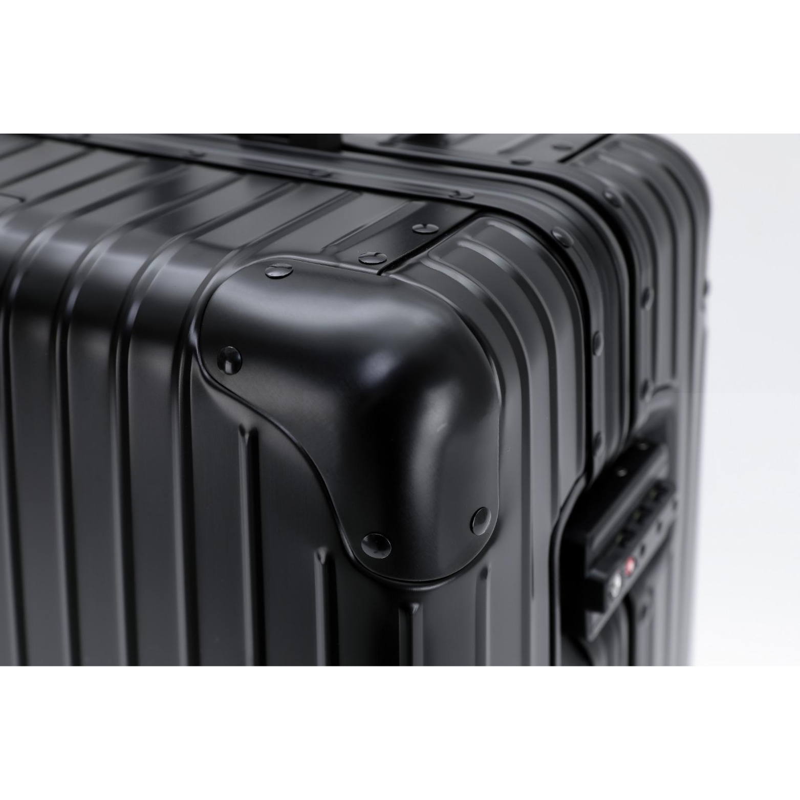 Stylish black aluminum suitcase for business travelers
